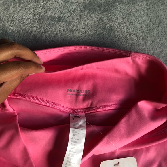 Fabletics Anywhere High-Waisted Short 9” Pink Rouge - Picture 7 of 9